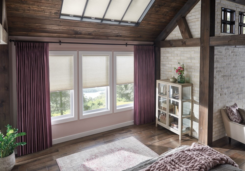 Skylights: 3/4" Single Cell SkyTrack??? Skylight Cellular Shades with Cordless Lift: Fanfare, Cosmic Light 0692Windows: 3/4" Single Cell Cellular Shades with Cordless Lift: Fanfare, Cosmic Light 0692Drapery: Pinch Pleat Drapery: Luminous, Majestic 2250  Hardware: 1 3/8" Opulence Wood Traverse Pole with Kirtling Finials: Regal Walnut 409